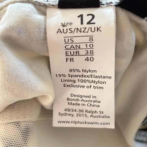 Nip Tuck Swimsuit Size 12 Twist Front One Piece Black Gold Ivory Multifit Cup - Picture 7 of 13